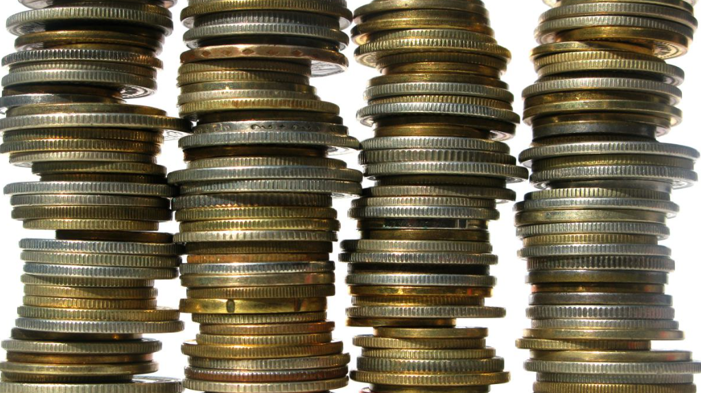 چرا لبه سکه ها شیار دارد؟