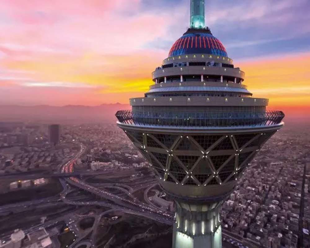01795f3e-14ff-4c85-8700-161e7f60bbcb-a-view-of-the-top-structure-of-milad-tower-with-tehran-in-the-background.jpg
